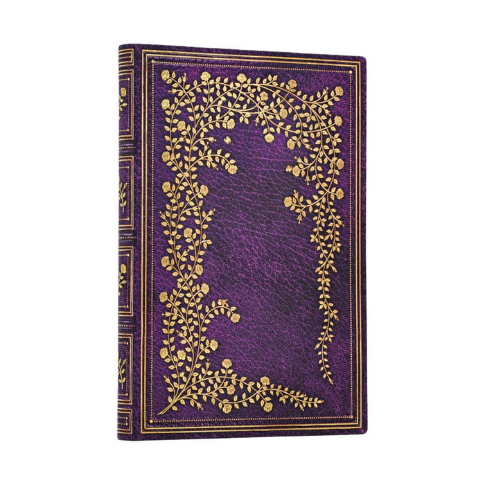 Purple notebook with gold floral design on a white background